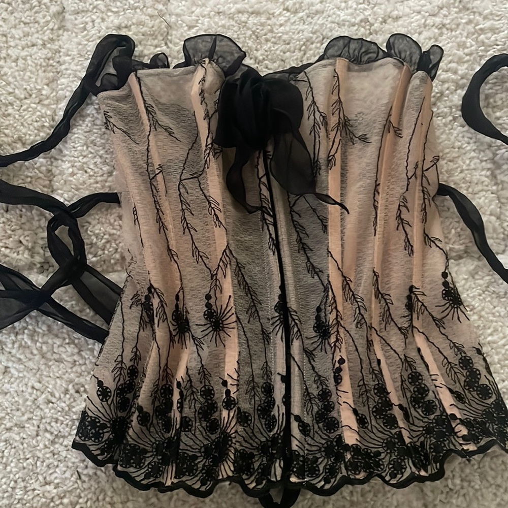 Janet Reger corset top size S, clasp in front fabric wrapped in the back.